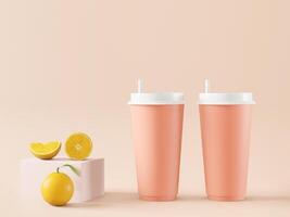 Plastic glass for orange juice on a pink background. photo