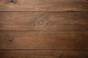 Dark old wooden table texture background top view photo