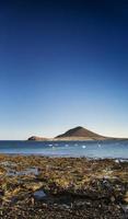 La Tejita kite surfing beach and Montana Roja landmark in south Tenerife Spain
