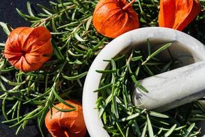 Alternative medicine with rosemary photo