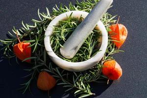 Alternative medicine with rosemary photo