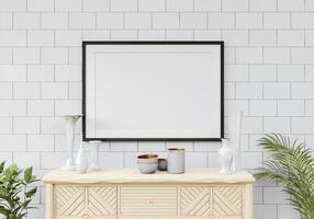 The living room is decorated with a storage table and picture frames. photo