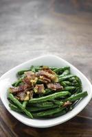 Sauteed garlic butter green beans with bacon snack photo