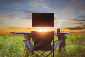 Outdoor office with coffee cup photo