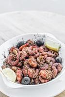 Fresh prawns fried in garlic olive oil seafood Portuguese tapas snack photo