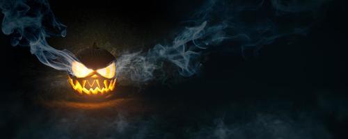 Halloween pumpkin on dark background photo