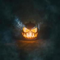Halloween pumpkin on dark background photo