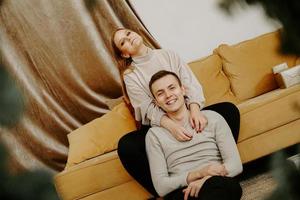 Couple relaxing together on the couch photo