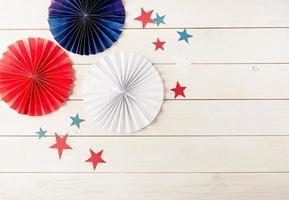 Decorations for 4th July, Independence Day USA. Paper fans and stars photo