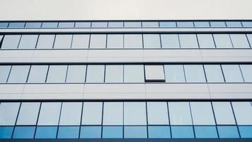 Perspective textured background of glass building photo