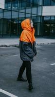 Girl in protective overalls and glasses. Air pollution concept photo