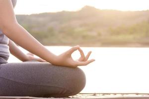 Woman practicing yoga photo