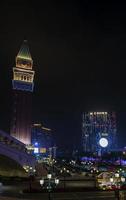 Casino hotel resorts neon on Cotai strip Macao Macau China at night photo