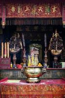 Shrine altar detail inside famous Chinese A-Ma temple in Macau China photo