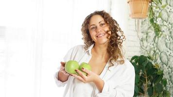 Senior woman with apples. Diet. Healthy lifestyle. photo