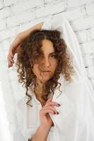 Beautiful Woman with curly hair portrait photo