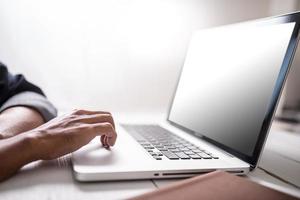 Business man using laptop computer. photo