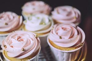 Close up of Cupcakes on wooden table. photo