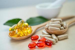 Alternative medicine herbal organic capsule with vitamin E photo