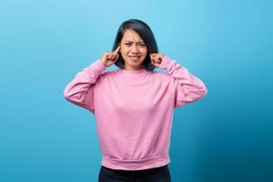 Portrait of Woman giving sign stop making that loud noise photo