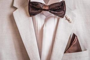 Mens suit, shirt and handkerchief butterfly, handkerchief in pocket photo