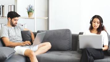 Couple working from home together photo