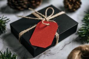 Gift boxes with small gifts on white cement