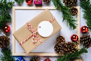 Gift boxes with small gifts on white cement photo