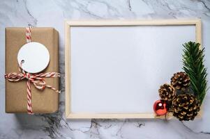 Gift boxes with small gifts on white cement photo