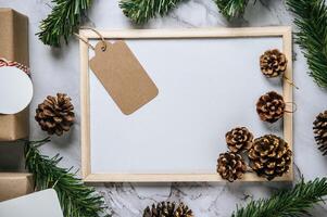 Mock up of flip chart on the cement floor with Christmas photo