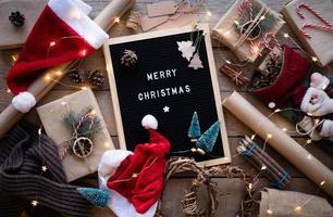 Letter board with the words Merry Christmas and new year decorations photo