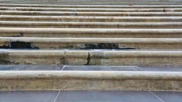 Concrete staircase slightly wet from the rain photo