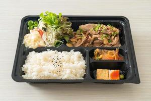 Japanese rice with pork yaki bento set photo