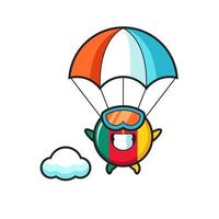 cameroon flag badge mascot cartoon is skydiving with happy gesture vector
