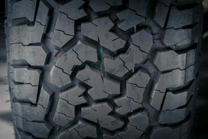 Close-up of all terrain tire patterns and textures. photo