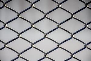 Close up Steel cage pattern background, Safety and Defense concept