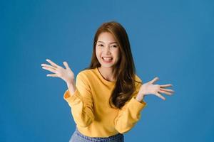 Young lady feeling happiness joyful surprise funky on blue background.