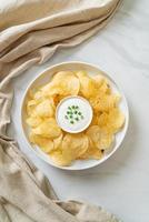 Potato chips with sour cream photo