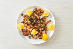 Jerk shrimps or grilled shrimps in Jamaica style photo