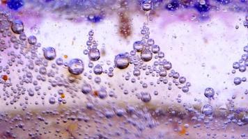 bubblor i olja och vatten med bläck video