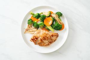 Grilled chicken steak with vegetable photo