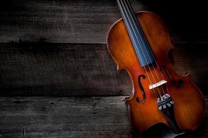 The violin on the table, Close up of violin on the wooden floo photo