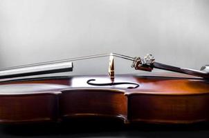 The violin on the table, Close up of violin on the wooden floo photo