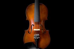 The violin on the table, Close up of violin on the wooden floo photo