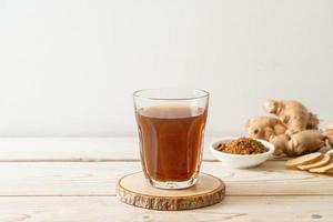 Hot and sweet ginger juice glass photo