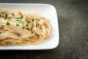 Stir-fried golden needle mushroom with butter photo