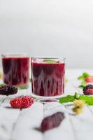 Mulberry juice and mulberry fruit, Fresh berry fruit smoothies. photo