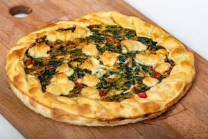 Vegetable Tart, puff pastry, chard, carrot, onion, garlic and red pepp photo