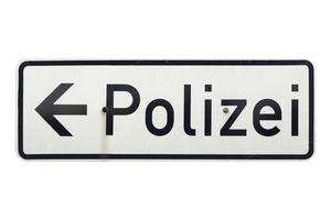 German sign isolated over white. Polizei Police photo