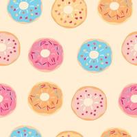 Seamless pattern with testy colorful donuts on beige vector